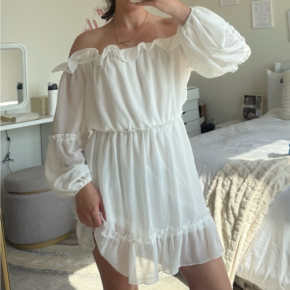 Miss Ord white off the shoulder ruffle mini dress